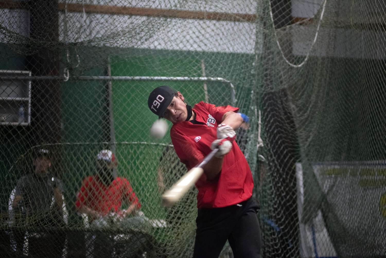 Tenino sophomore Easton Snider takes a cut at the batting cage on Nov. 4.