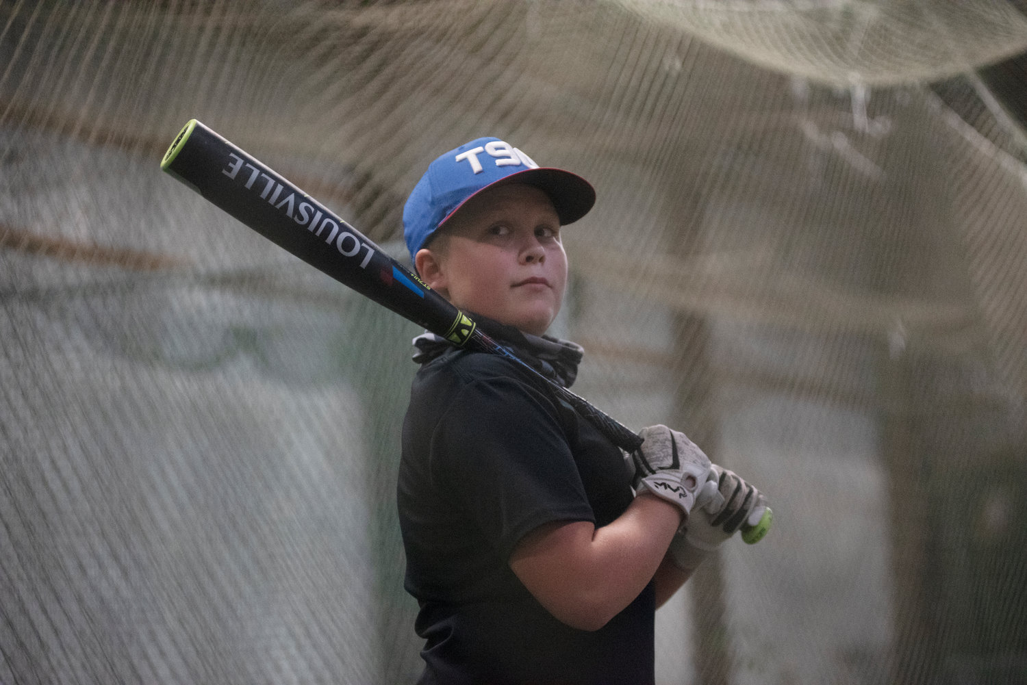 Tenino eighth grader Jaxson Gore prepares to take some swings in the batting cage on Nov. 4.