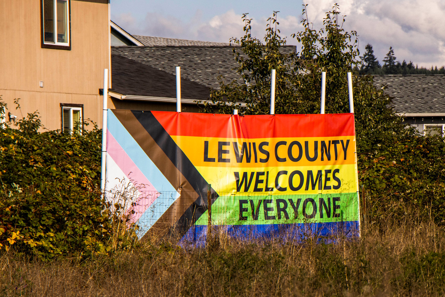 A new ‘Lewis County Welcomes Everyone’ sign was installed in view from Interstate 5 in south Chehalis seen Thursday.