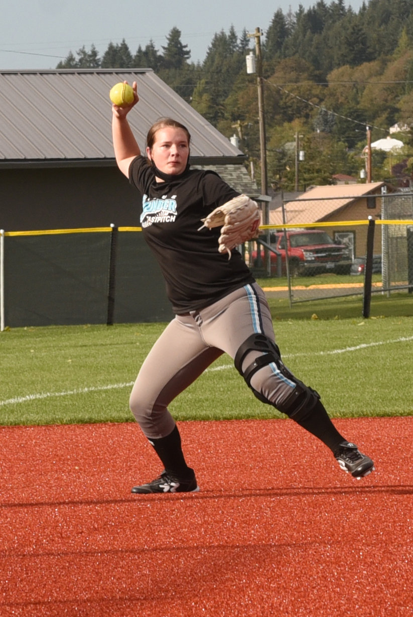 W.F. West’s Savannah Hawkins makes a throw from third base during practice on Monday.
