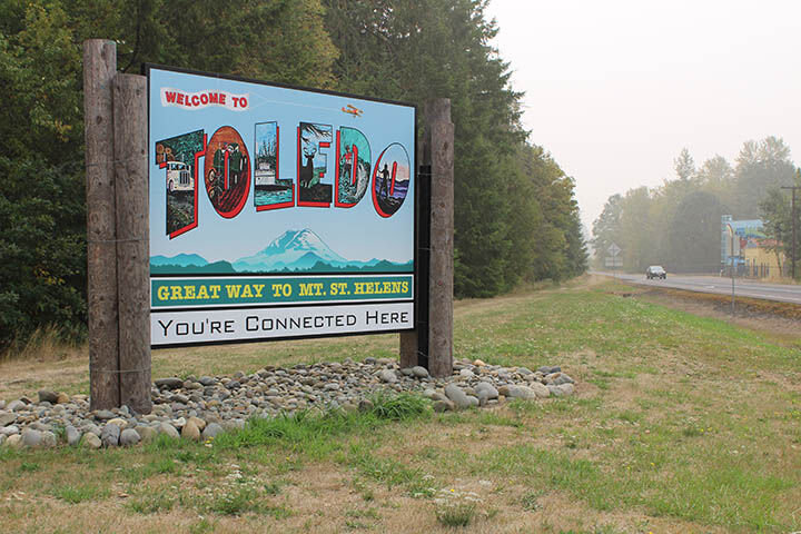 The welcome sign for Toledo proudly declares the community's connectivity.