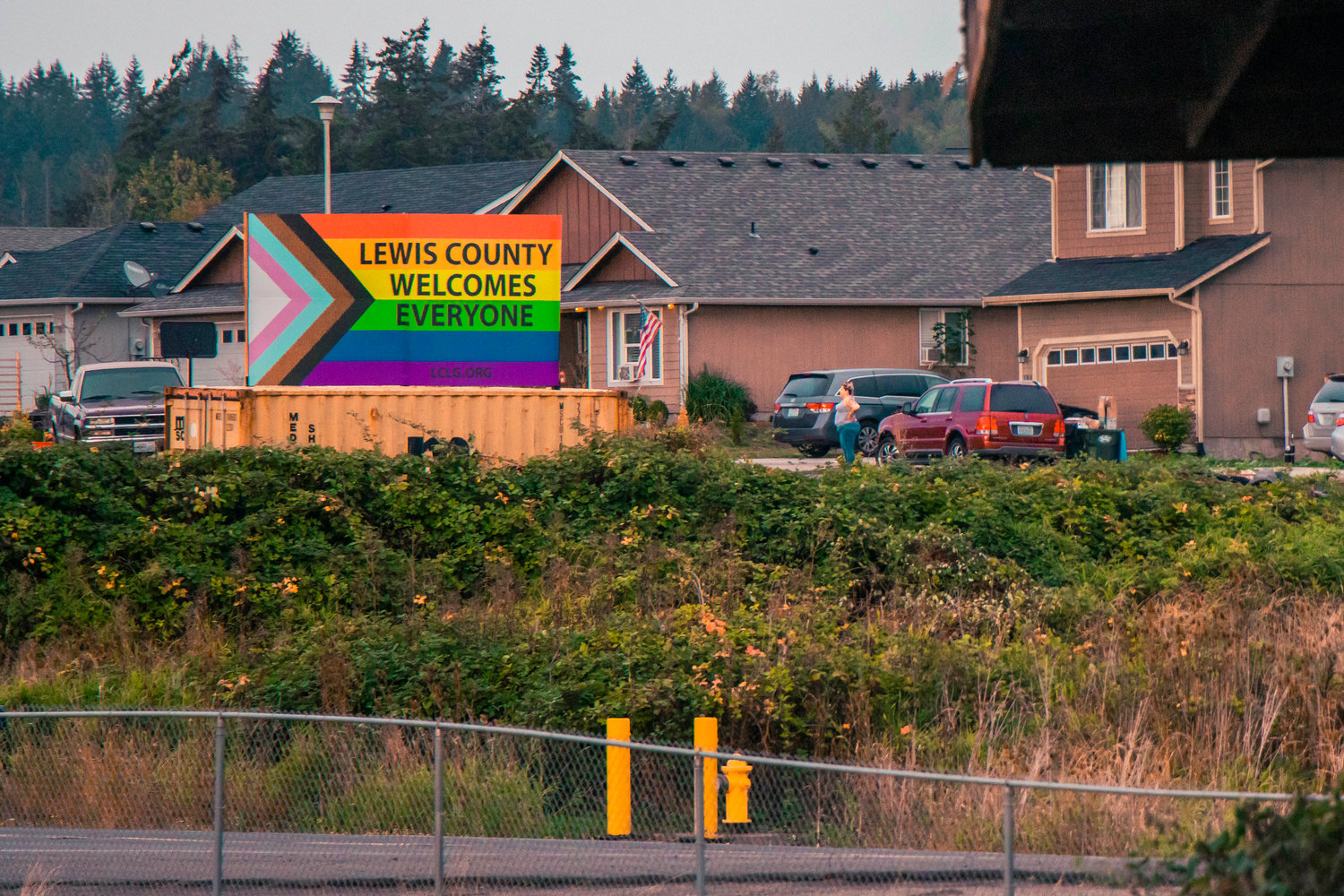 A sign reads, ‘Lewis County Welcomes Everyone’ seen Saturday evening in South Chehalis.
