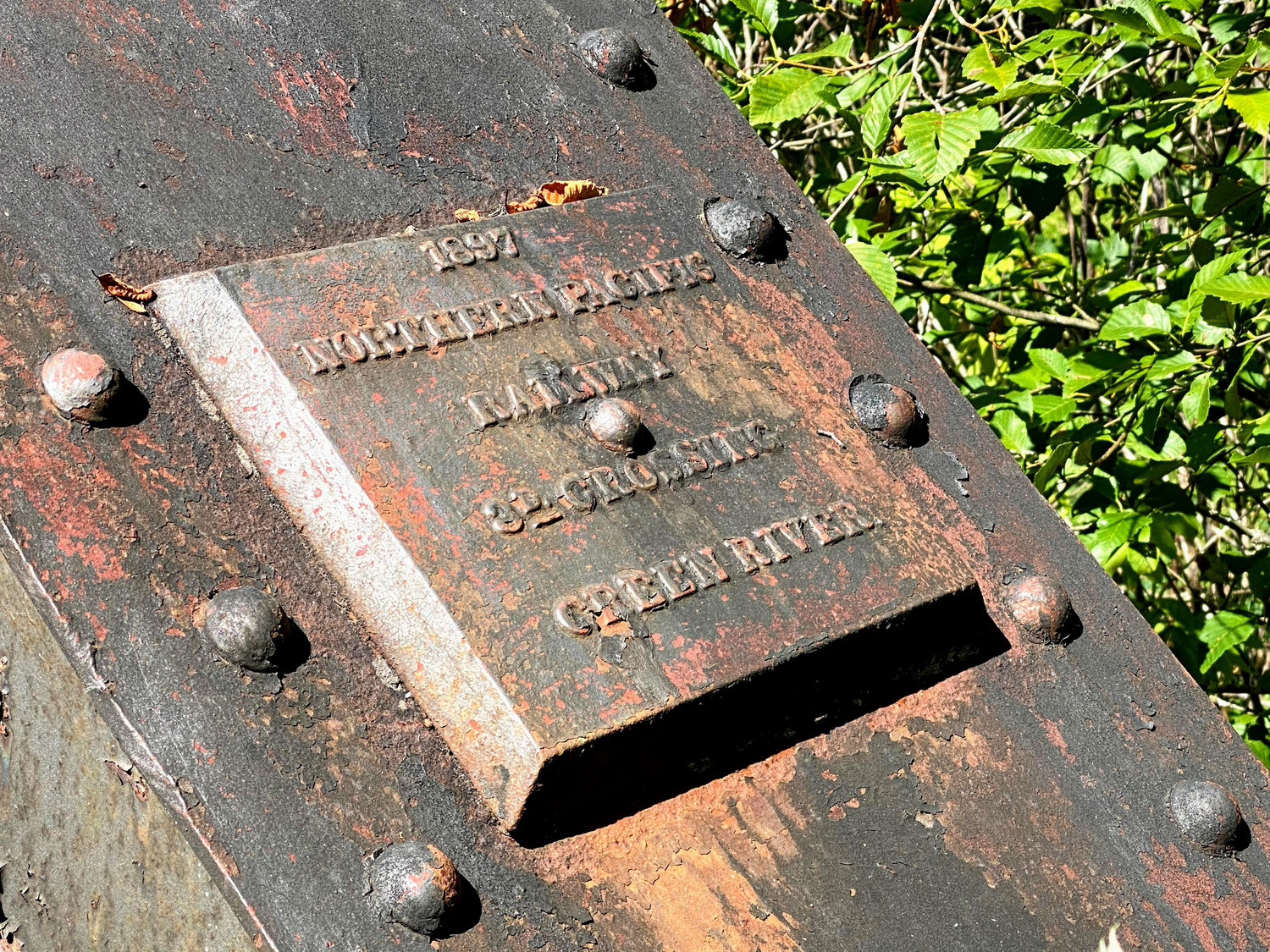 A plaque showing the date of construction of a bridge is shown just west of Lebam on the Willapa Hills Trail, which once served as a railroad line linking Chehalis to South Bend.