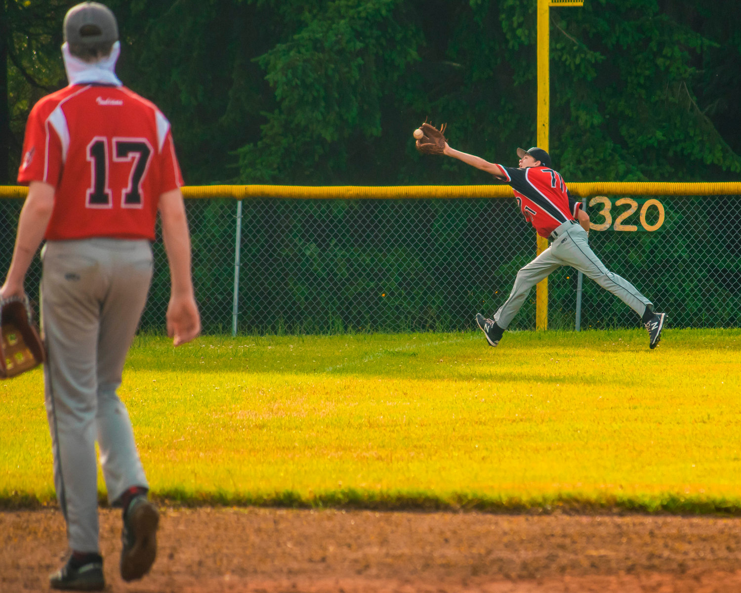 Toledo’s Rogan Stanley (71) stretches to make an out during a game against the Dirtbags Tuesday afternoon in Winlock.