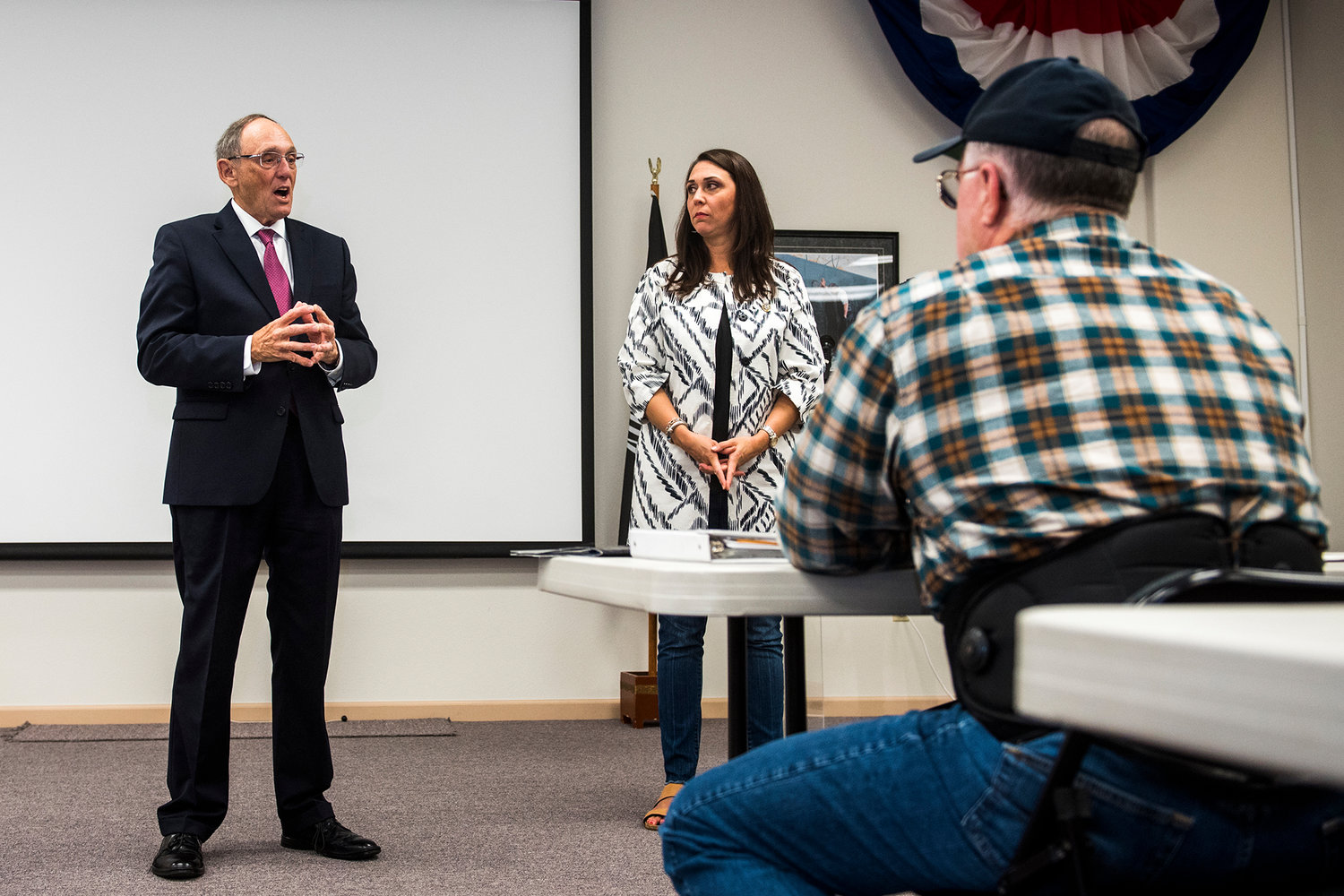 Rep. Phil Roe, left, of Tennessee, and Rep. Jaime Herrera Beutler, center, talk to veterans during a public meeting Monday afternoon at the Chehalis Veterans Memorial Museum.