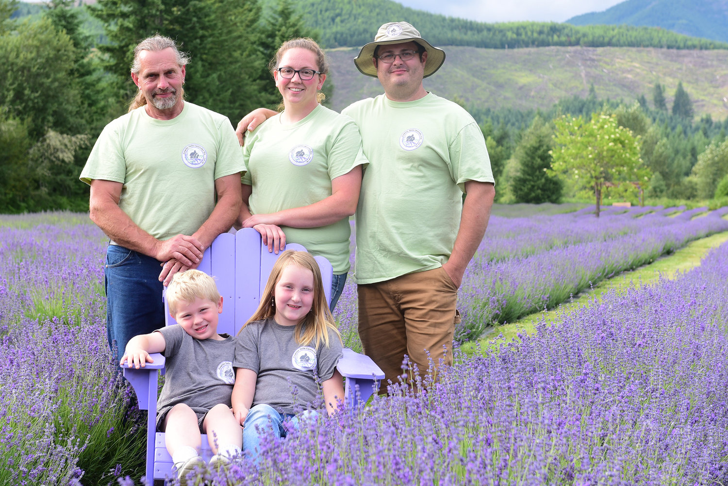 From top left: Tim, Jordann and Justin Claibourn own and operate the Cowlitz Falls Lavender Company in Randle. Jordann and Justin’s children Mason and Deven are seated in front.