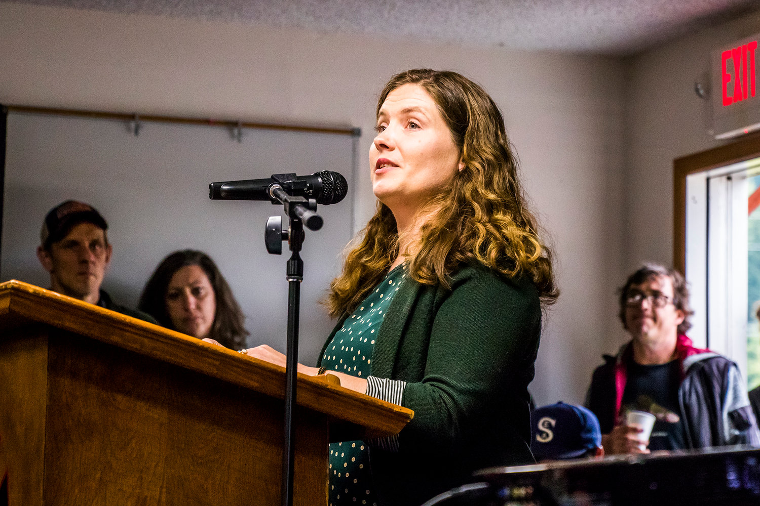 Julia DeGraw addresses a packed town hall in Randle opposing a proposed bottling plant. DeGraw helped lead opposition blocked a plant proposal in Cascade Locks, Oregon.