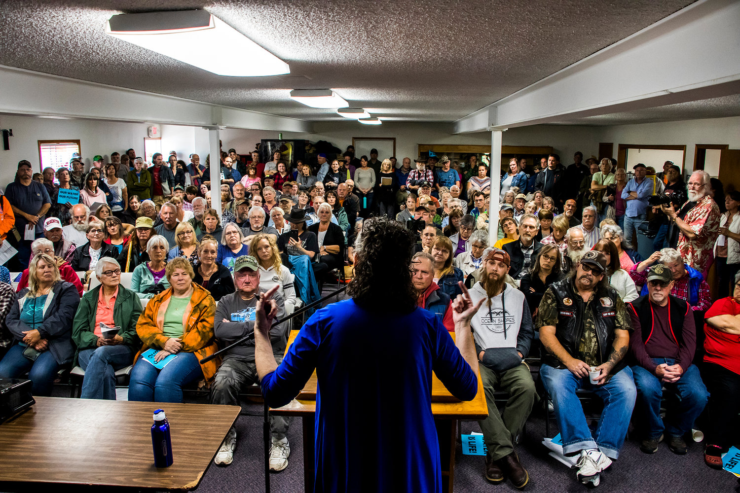 Former Cascade Locks, Oregon city councilor Deanna Busdieker addresses a packed town hall in Randle opposing a proposed water bottling plant. Budsieker helped lead opposition to a proposed plant in Cascade Locks.