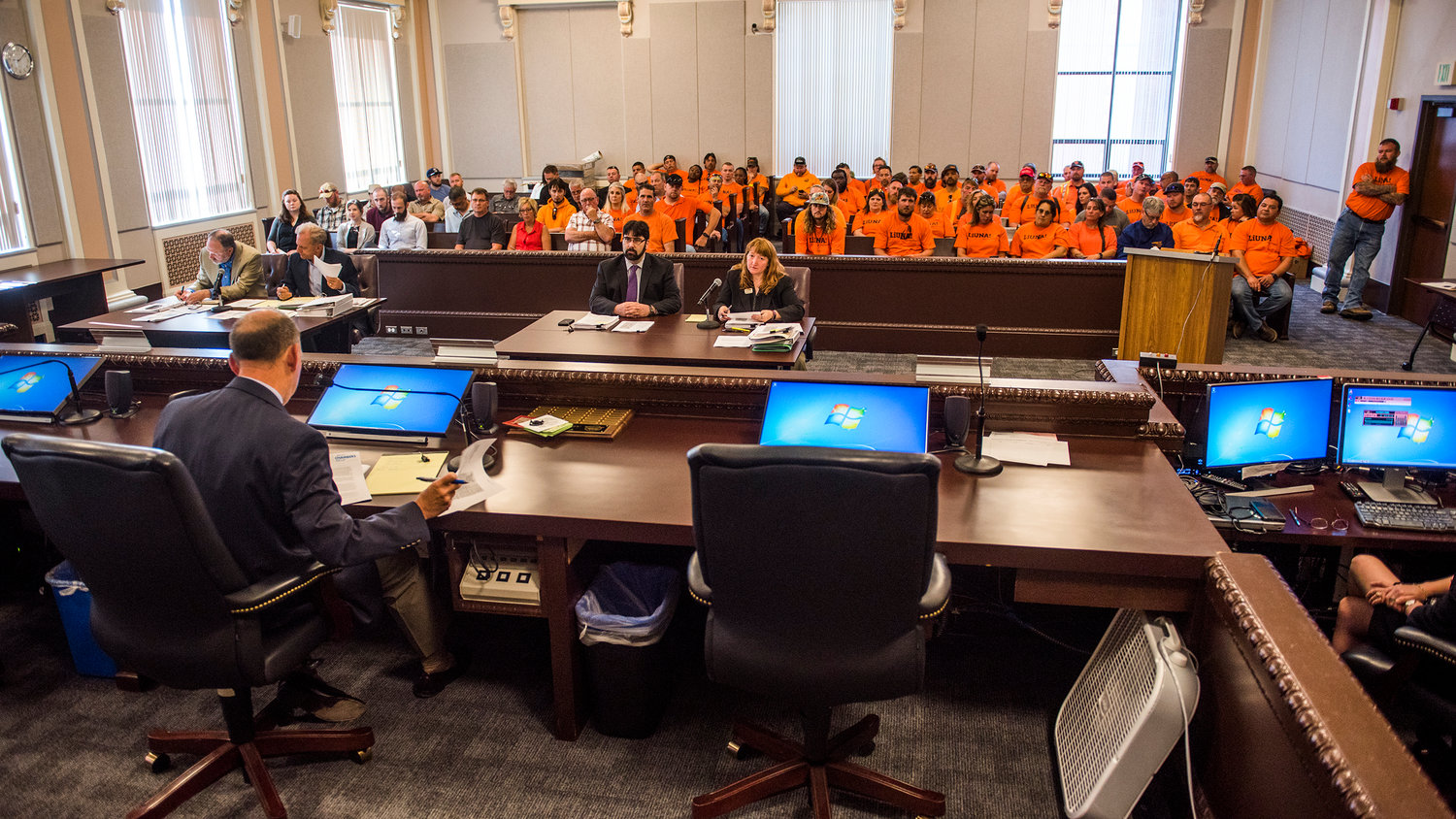 Scores of members of the Laborers' International Union of North America sit in on a hearing on the Skookumchuck Wind Energy Project to push for local hiring.