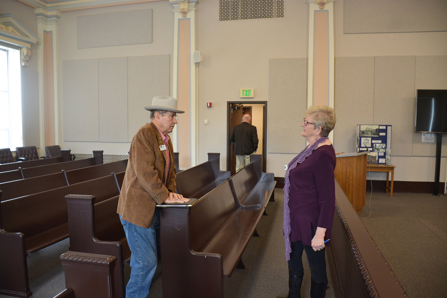 Chehalis River Basin Flood Authority representatives Ron Averill, left, and Edna Fund speak following a county commission meeting Monday morning.