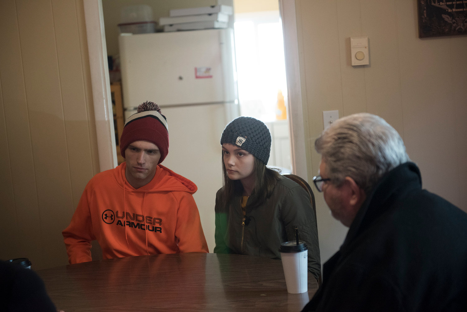 George Payne (left) and Sam Moyer (right) sit for an interview inside the house Nancy Moyer lived at the time of her disappearance.