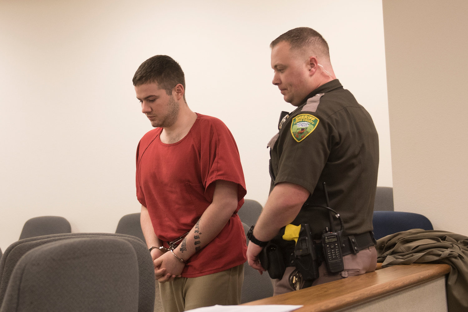 Jonathon Adamson appears at an arraignment hearing in Lewis County Superior Court on Thursday, March 7, 2019.