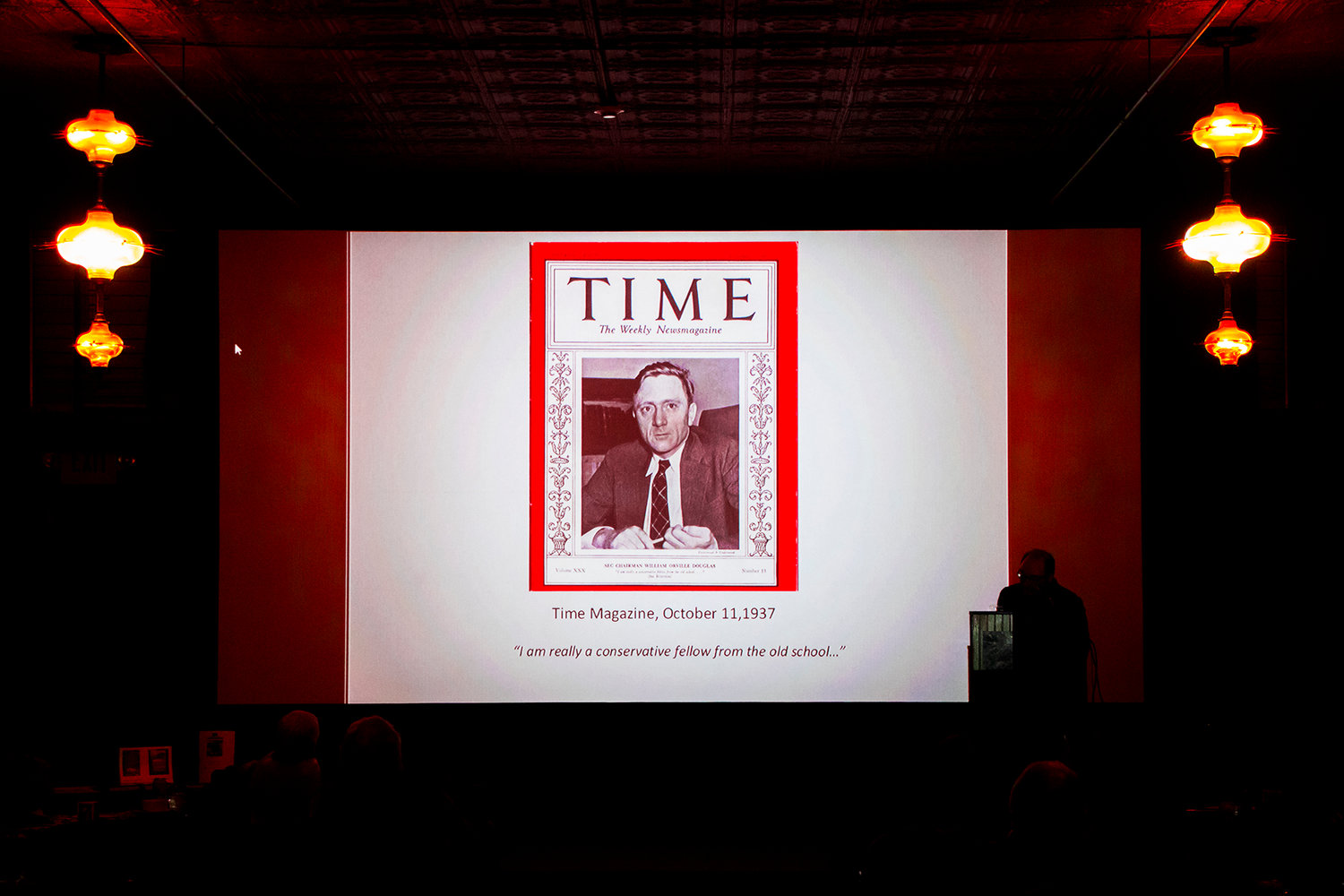 A Time Magazine cover is displayed showing late Associate Justice of the Supreme Court, William O. Douglas, as John Concillo talks about his life Wednesday night at the Olympic Club Theater room in Centralia.