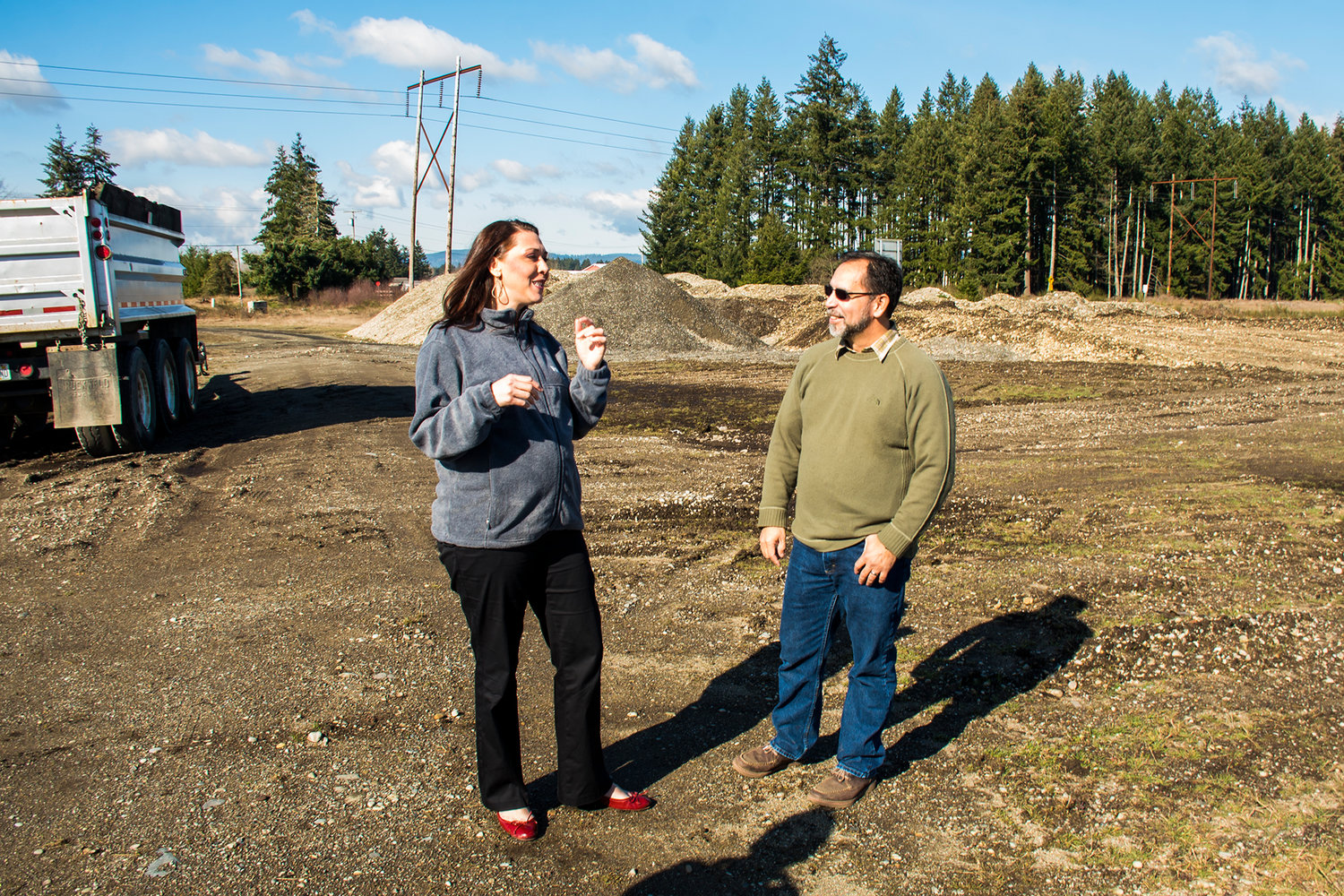 Rep. Jaime Herrera Beutler, R-Battle Ground, speaks with David Burnett, CEO of Chehalis Tribal Enterprises, on the site where the tribe will construct its Eagle One distillery.