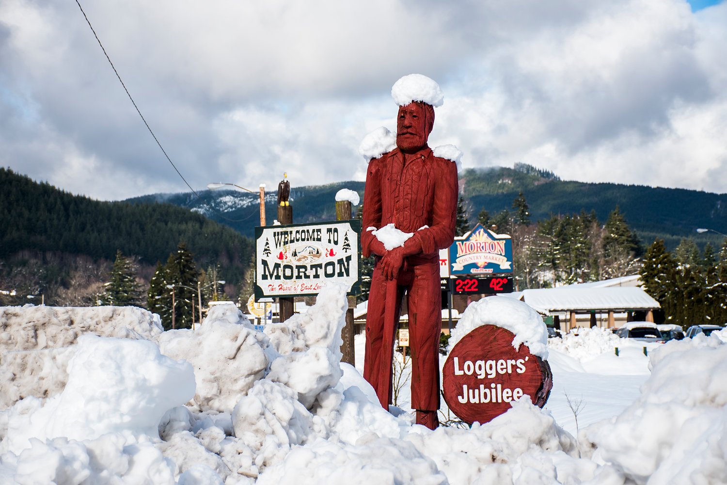The Morton Logger Statue is seen covered in snow Wednesday afternoon in Morton.