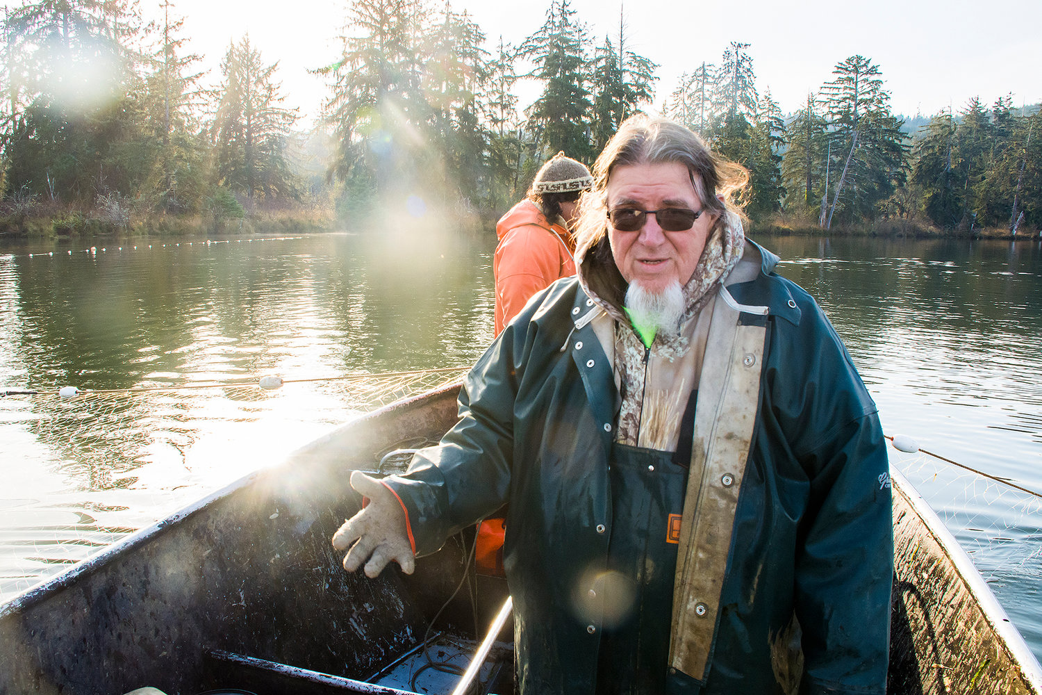 Ed Johnstone, fisheries policy spokesperson for the Quinault Indian Nation, gestures while checking his nets on the Chehalis River Tuesday morning.