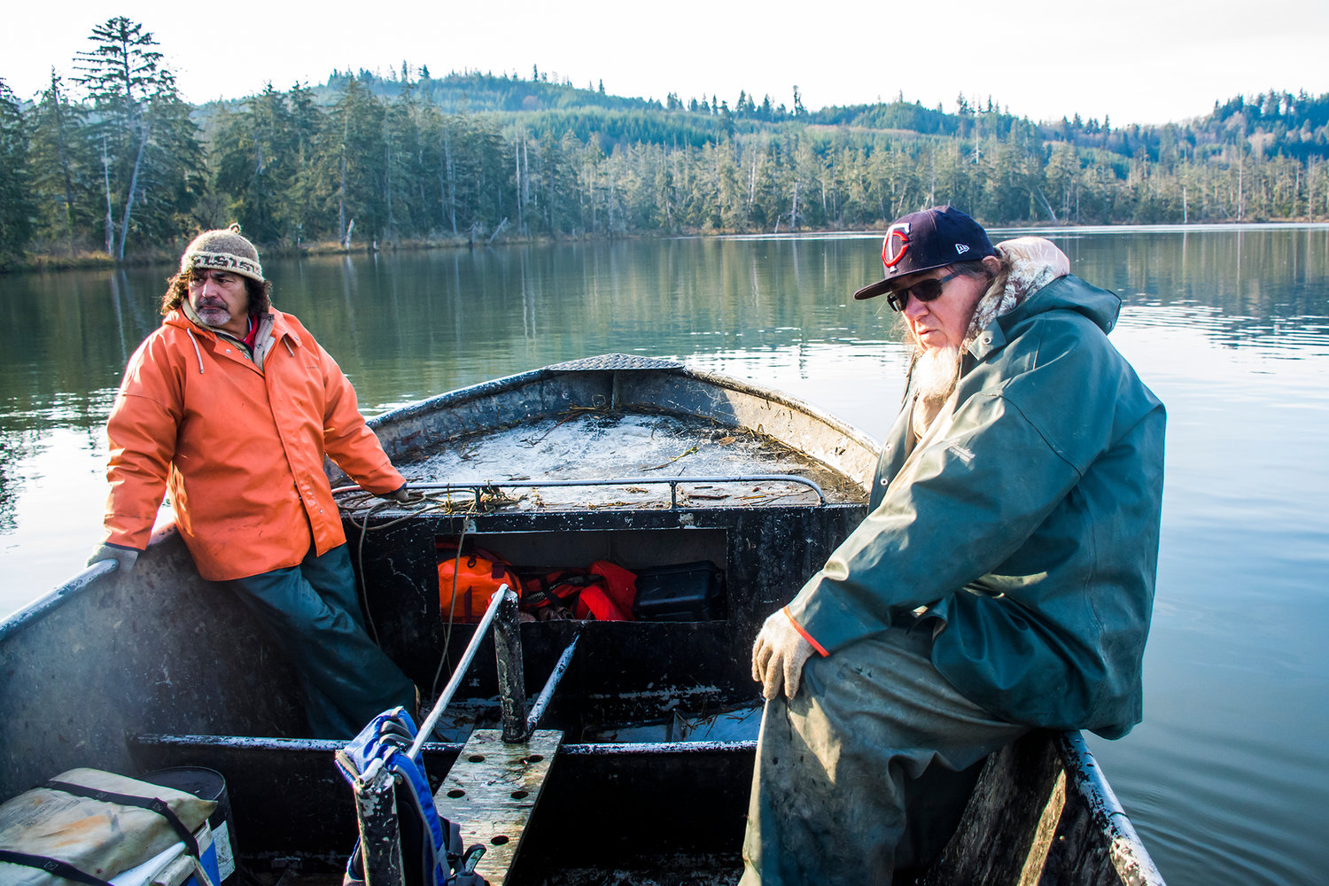 Ed Johnstone, right, fisheries policy spokesperson for the Quinault Indian Nation, and fishing partner Phillip "Dino" Blackburn, left, check nets on the Chehalis River Tuesday morning.