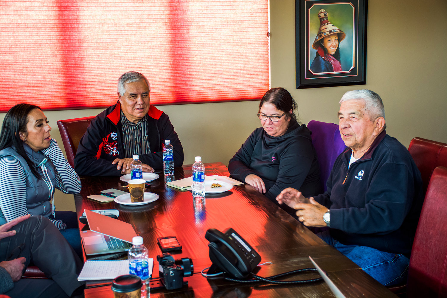 Quinault Indian Nation leaders talk in a meeting room at Q-Mart in Aberdeen Tuesday.