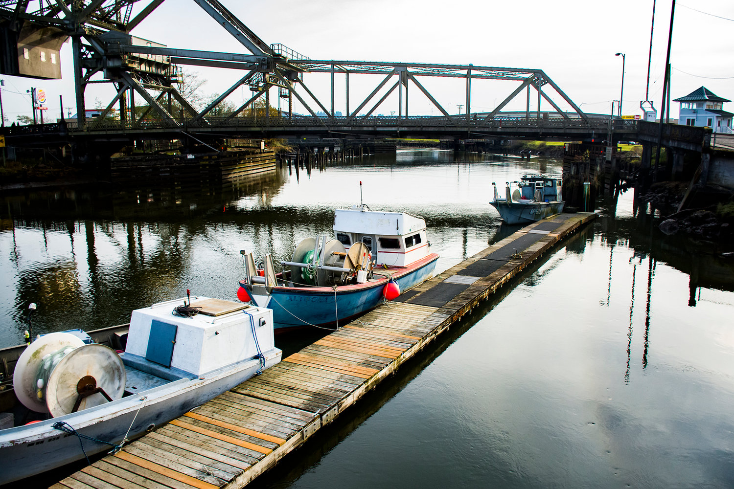 Boats sit at the dock at a Quinault fish plant in Aberdeen.