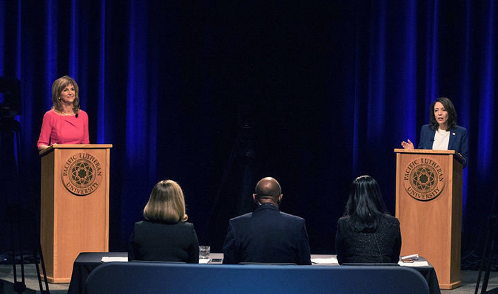 U.S. Sen. Maria Cantwell, right, and GOP challenger Susan Hutchison, former local TV news anchor and former state Republican chair, participate in a U.S. Senate debate at Pacific Lutheran University on Monday.