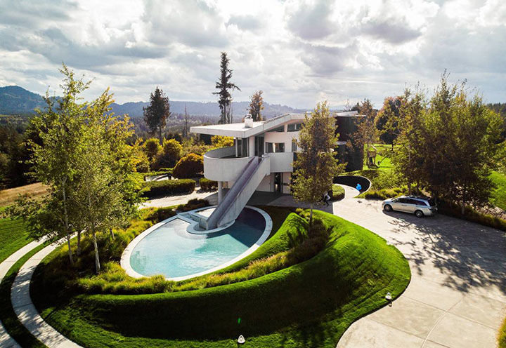 A diamond heiress is selling her home in Tenino. The property features a copper-lined meditation room, a blind archery range, and landscaping inspired by The Garden of Cosmic Speculation. The estate is called Merkaba, which, potential buyers are told, means light, spirit and body. The $11 million property is the most expensive personal property ever listed in Thurston, Pierce and Mason counties.