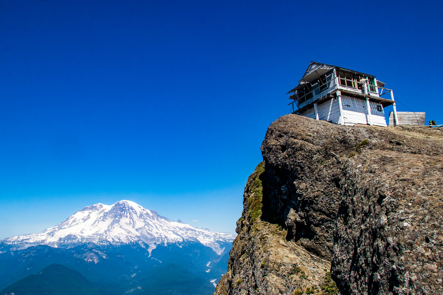 High Rock Lookout is seen in front of Mt. Rainier Tuesday afternoon in the Gifford Pinchot National Forest.