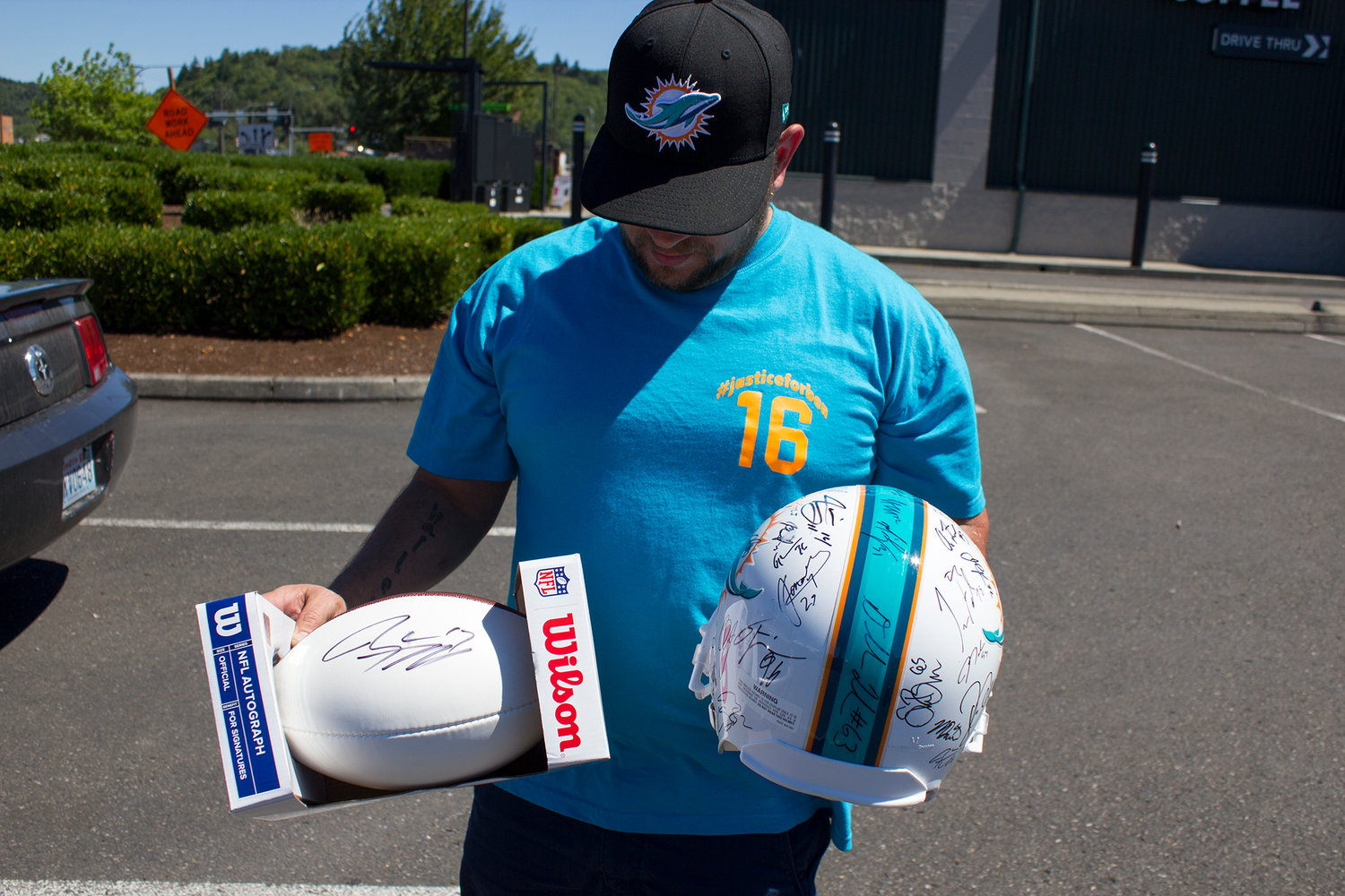 B.j. Eastman discusses his gifts from the Miami Dolphins on Wednesday afternoon in Chehalis.