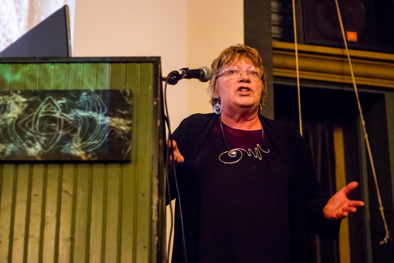 Maurene Morgan, the Washington State Mutual UFO Network (MUFON) State Section Director, talks about her occupation, during the "Unraveling A Mystery: UFOs and ETs in Ancient Art" showcase during Tuesday night History Pub at McMenamins Olympic Club.