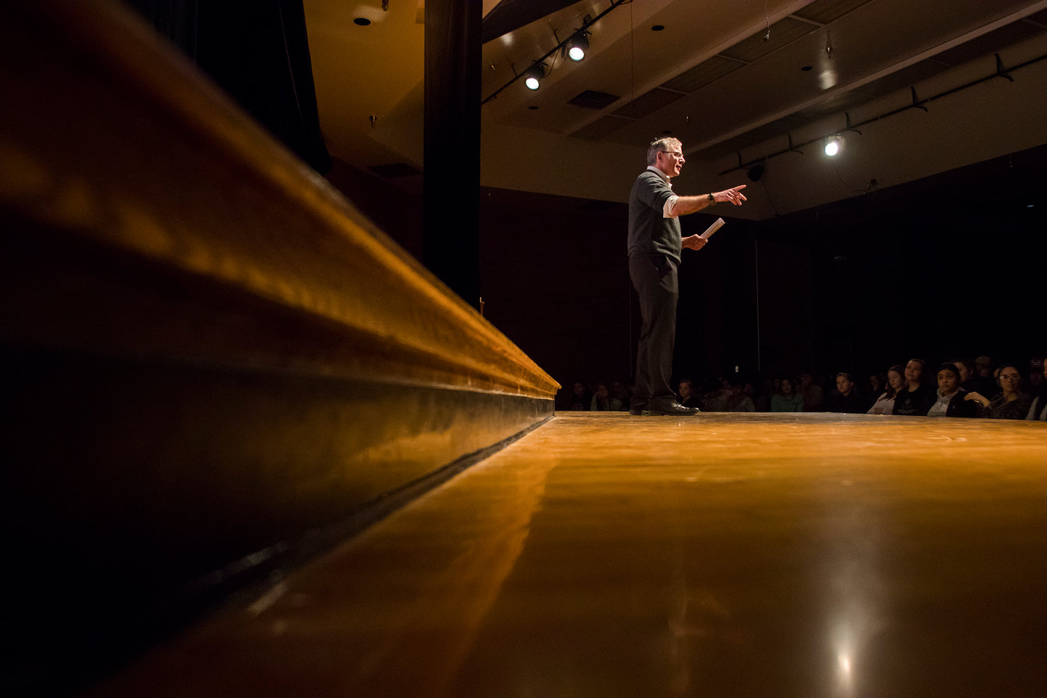 Matthew Erlich stands on stage and answers questions from students about the Holocaust Wednesday afternoon in the Centralia High School auditorium.