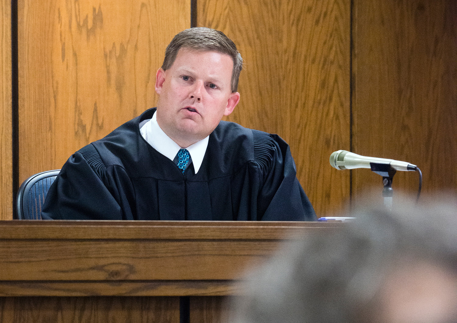 Lewis County District Court Judge R.W. Buzzard responds to arguments made during a hearing in 2014 at the Lewis County Law and Justice Center in Chehalis.
