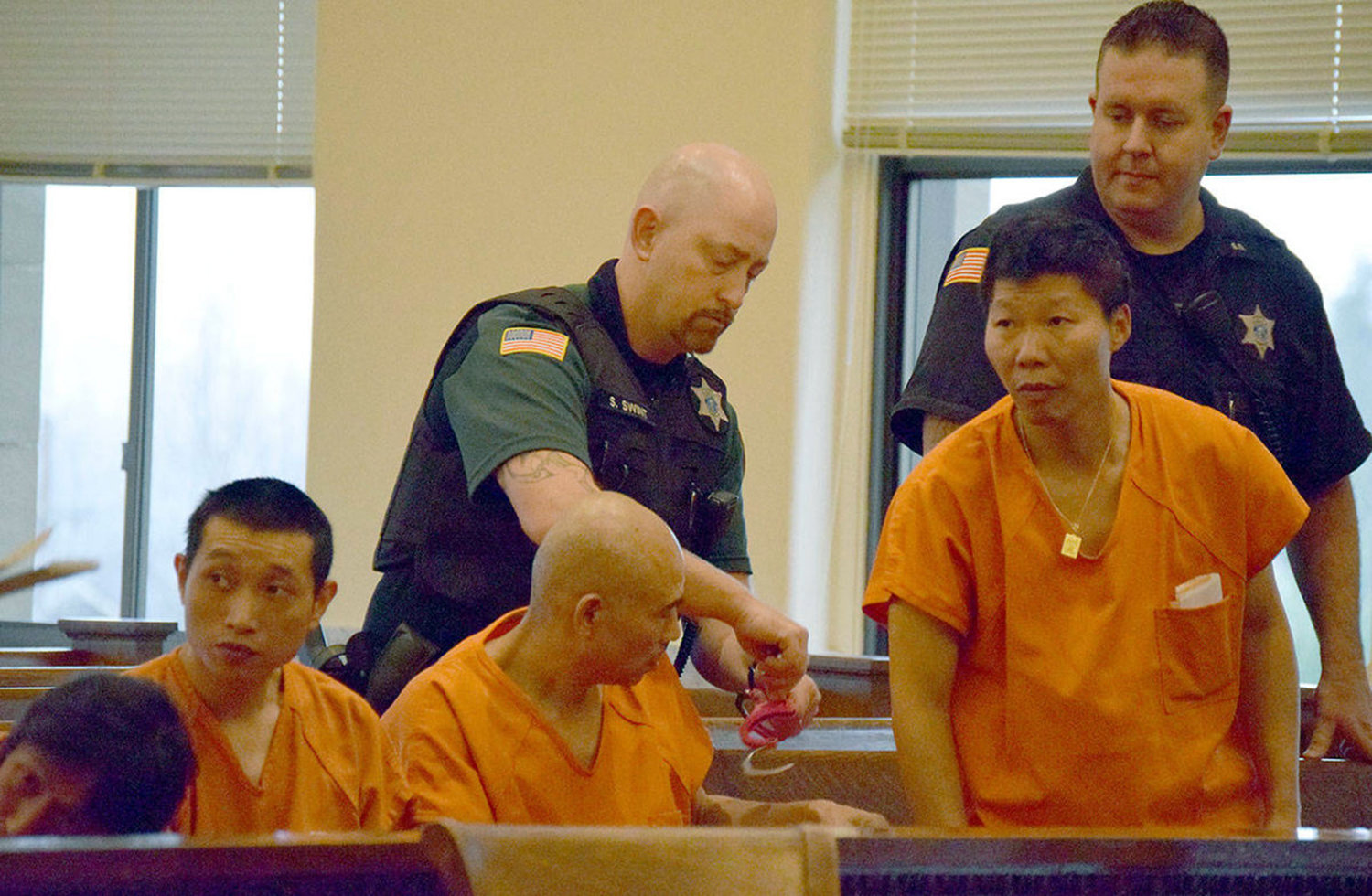 Four Chinese men arrested in relation to a major illegal marijuana grow operation made their initial appearance in Grays Harbor County Superior Court on Friday afternoon. Their arraignment was set for Dec. 11.