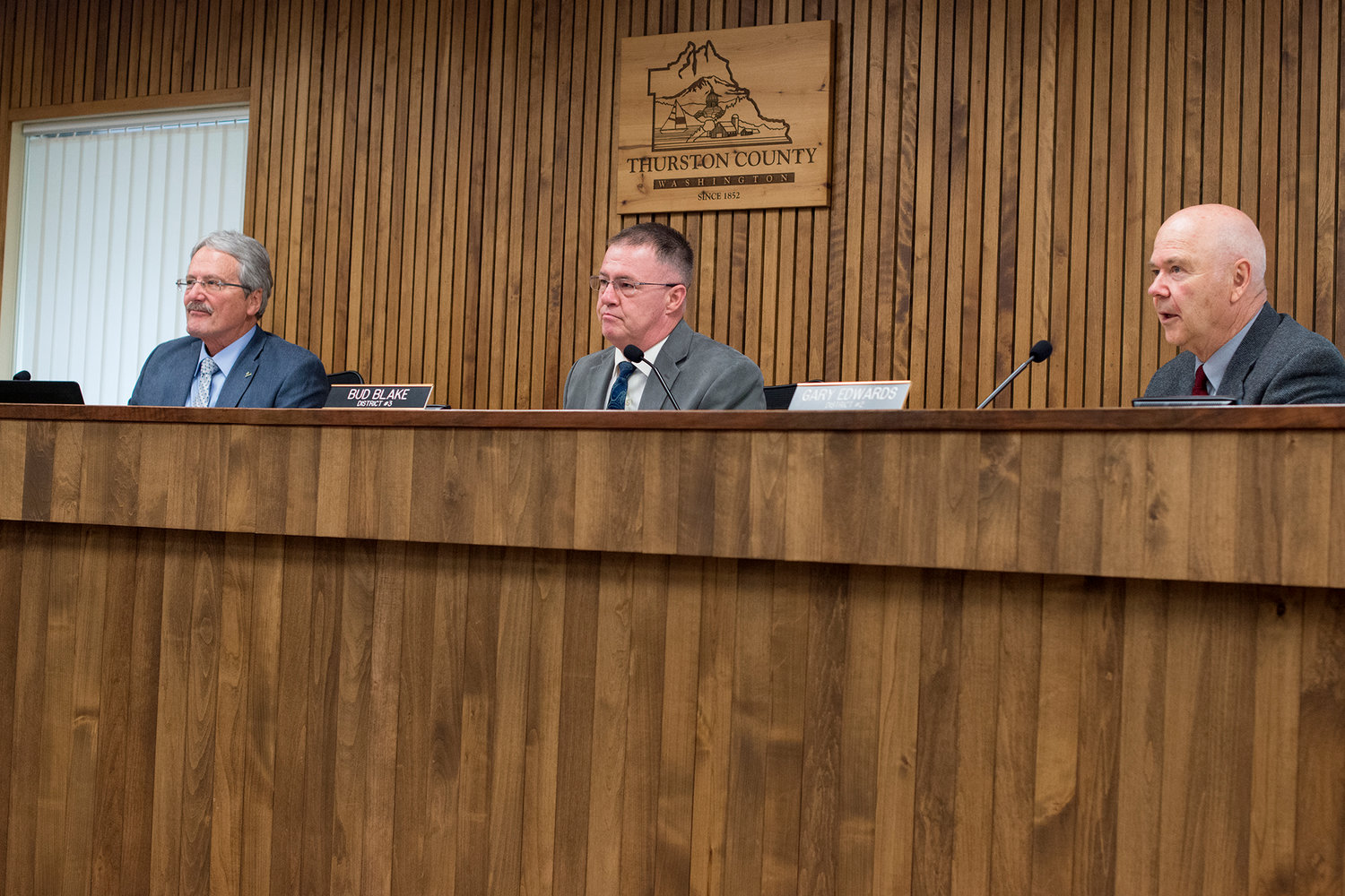 Thurston County Commissioners John Hutchings, Bud Blake and Gary Edwards listen to public comments during a meeting Tuesday, May 2, 2017, in Olympia.