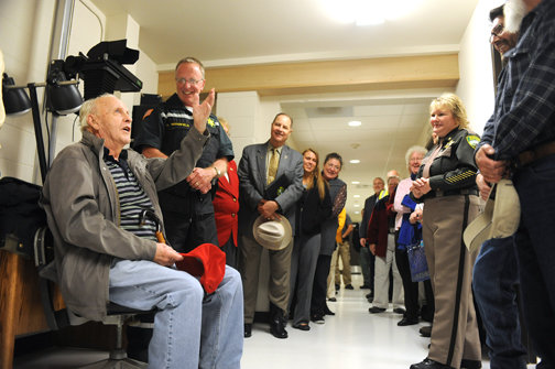 Former Lewis County Sheriff Bill Wiester, at left, hails the opening of a new evidence building for the Sheriff’s Office in Chehalis in April 2010. 
