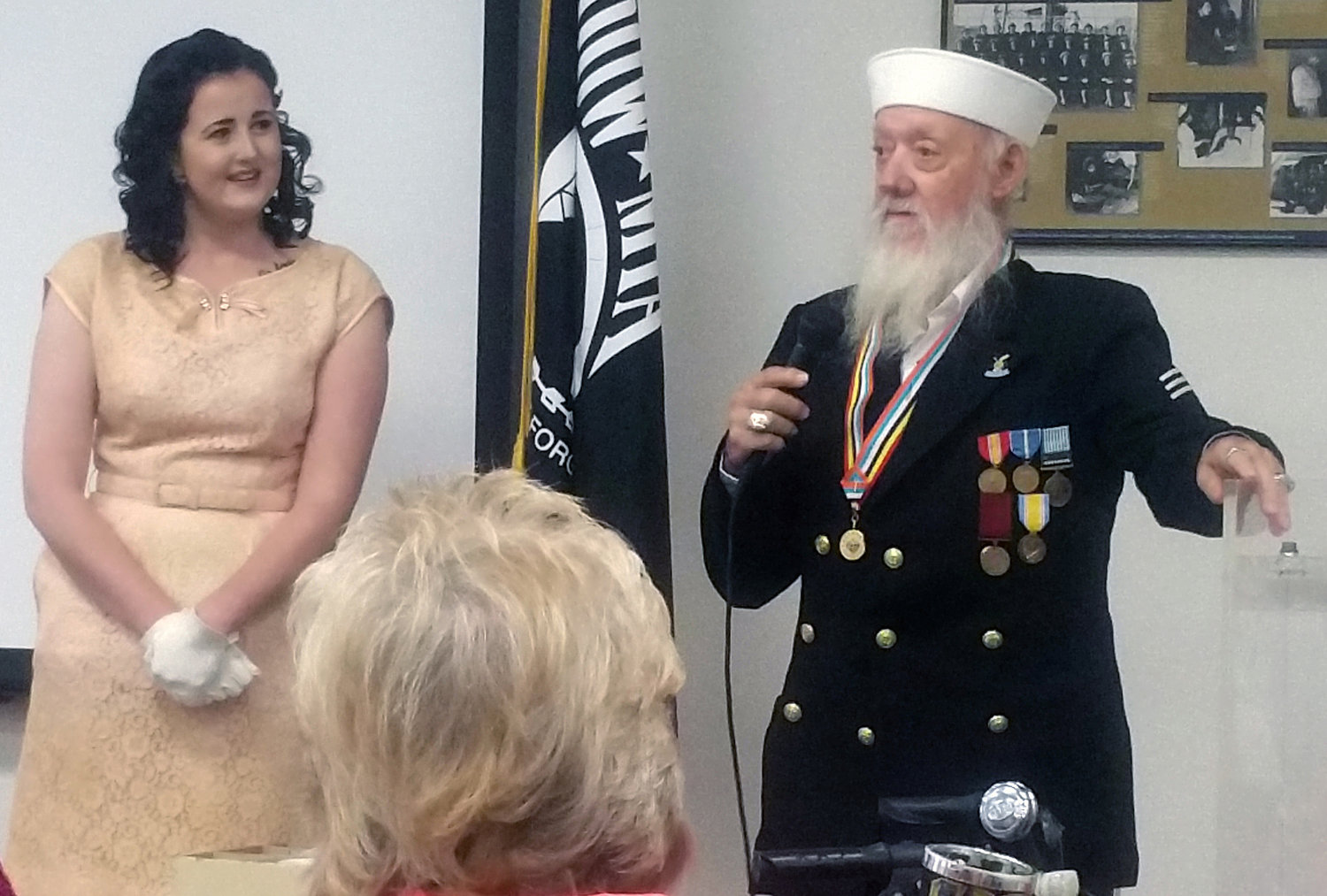 Jim Long shares his story with Kylie Dahl standing beside him Saturday at the Veterans Memorial Museum in Chehalis. 