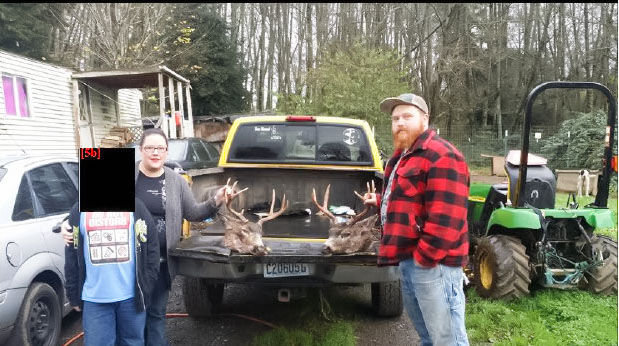 Aubri Mckenna and Joseph Dills pose with a pair of suspected poached deer in a photograph Dills posted to his Facebook account in November 2016. A youth is also visible in the photo but is blacked out to protect his identity. 