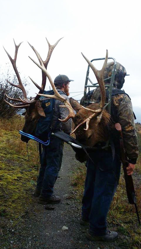 William Haynes (left) and Joseph Dills pose for a photo after poaching two bull elk near Coldwater Lake on Highway 504 headed toward Mt. St. Helens on Nov. 7, 2015. Only the ornamental heads were taken with both bodies left behind to waste.