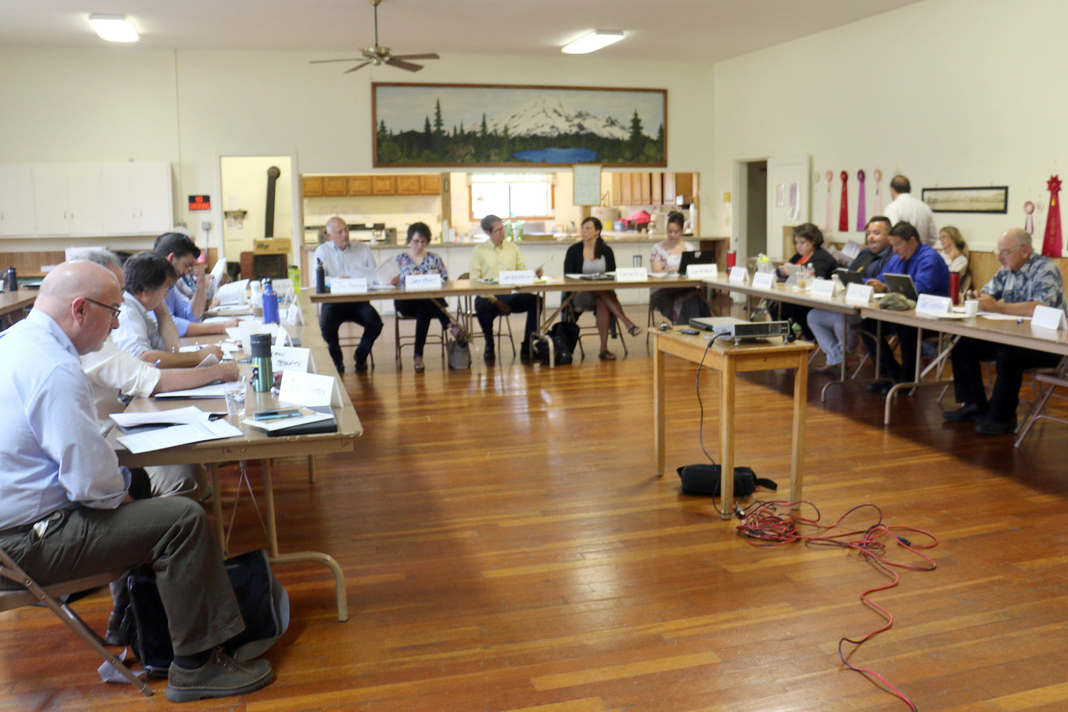 Board members of the newly established Office of the Chehalis Basin held their first meeting at the Adna Grange in this July 2017 file photo.