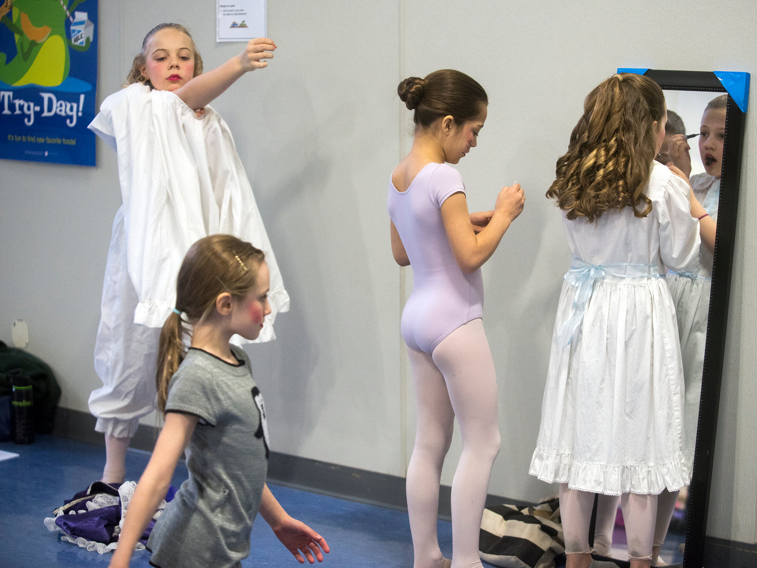 The cast of the Nutcracker prepare their costumes prior to taking the stage for the first of two Saturday performances in Pe Ell.
