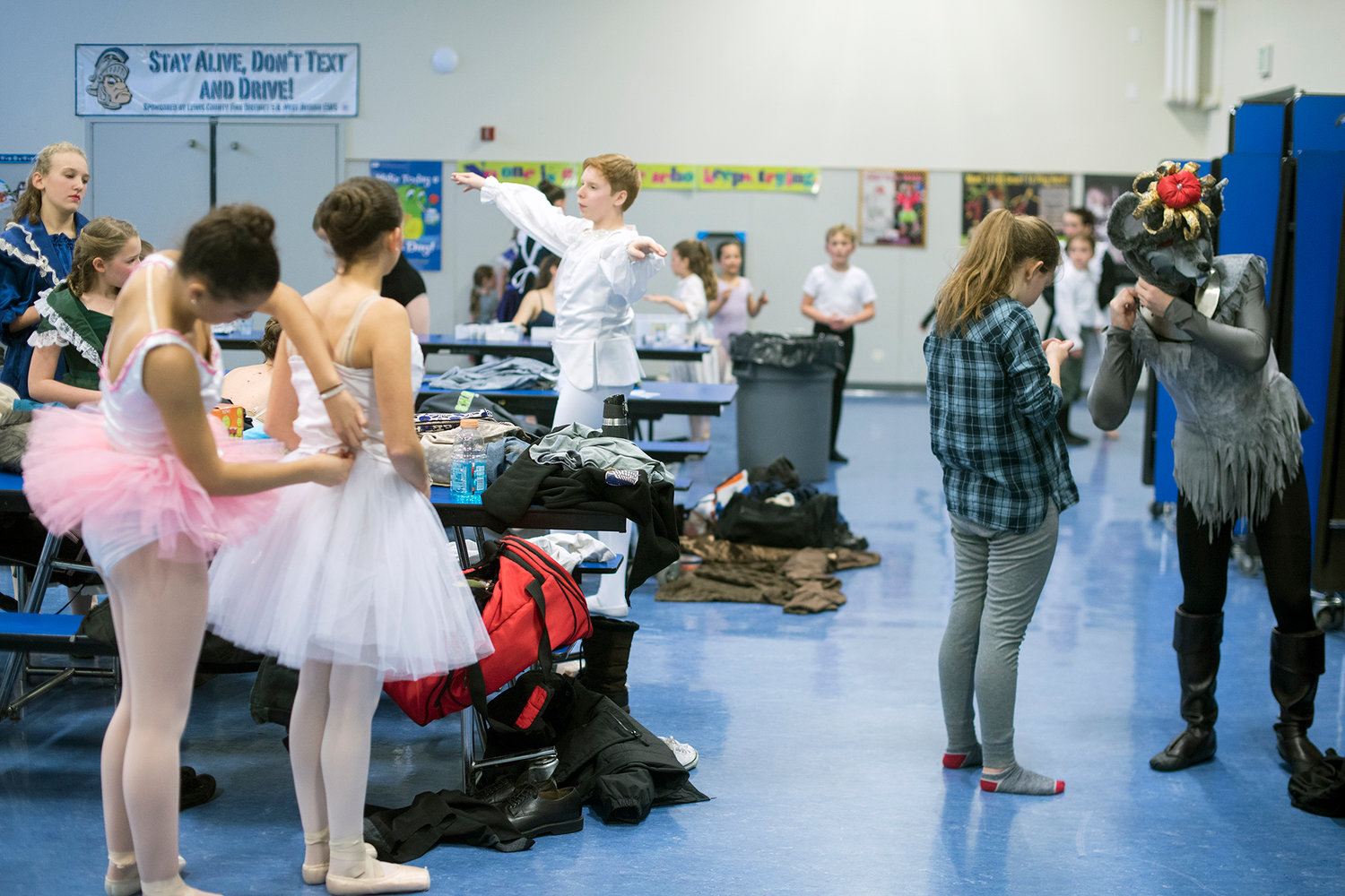 The cast of the Nutcracker prepare their costumes prior to taking the stage for the first of two Saturday performances in Pe Ell.