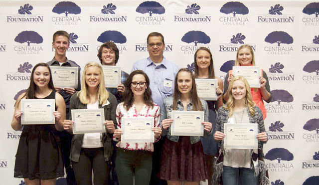 Students receive the Chehalis Indian Tribe Scholarship presented by Mark Weerasinghe, Centralia College Foundation board member. Left to right, top; Mason Caird, Kelly McCarthy, Weerasinghe, Julianna Mettler, Kylie Allen. Front; Genevieve Carney, Hailey Dickinson, Lindsey Misener, Lily Grubbs and Macy Moon.