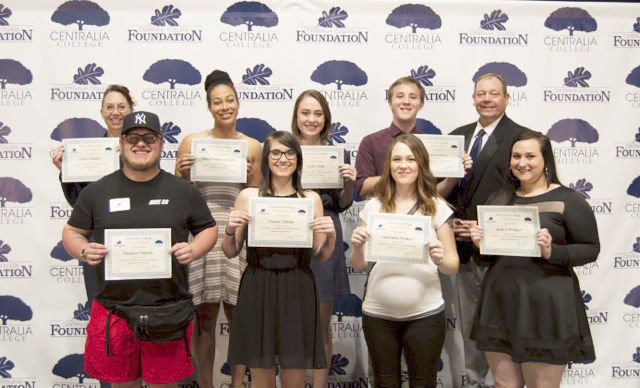The Earnest C. and Edith C. Driscoll Memorial Endowed Scholarship was presented by John Klumper, Centralia College Foundation board member. Upper left; Cheri Smalley, Tiana Thompson-Tyler, Emily Wills, Dawson Zinza, Klumper. Front; Matthew Shields, Nakita Tibbits, Samantha Walters and Kelsey Wullger.