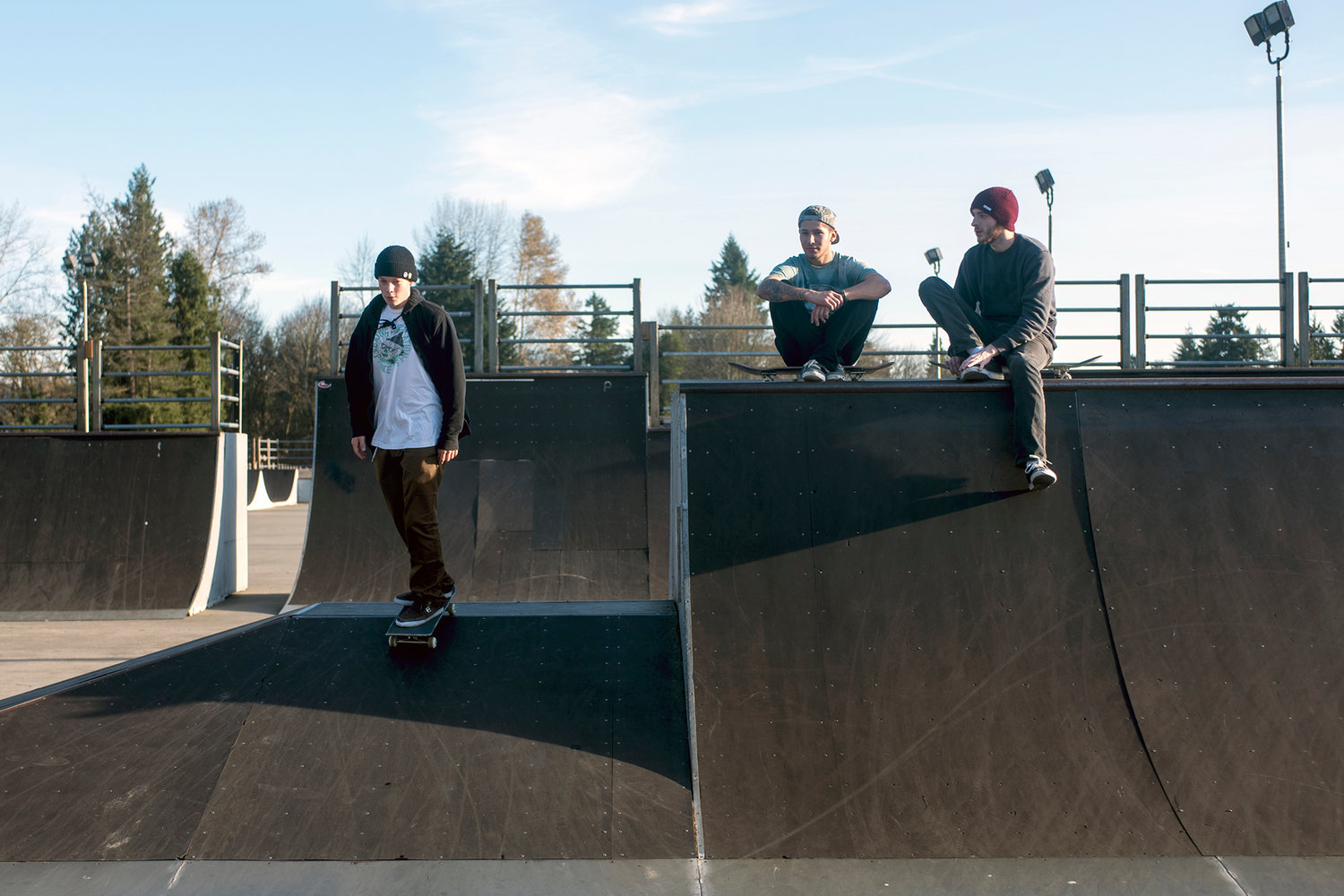 Greg DeHart skates over a ramp at Riverside Skate Park as his friends look on in November 2014. The city of Centralia is planning improvements for the park.