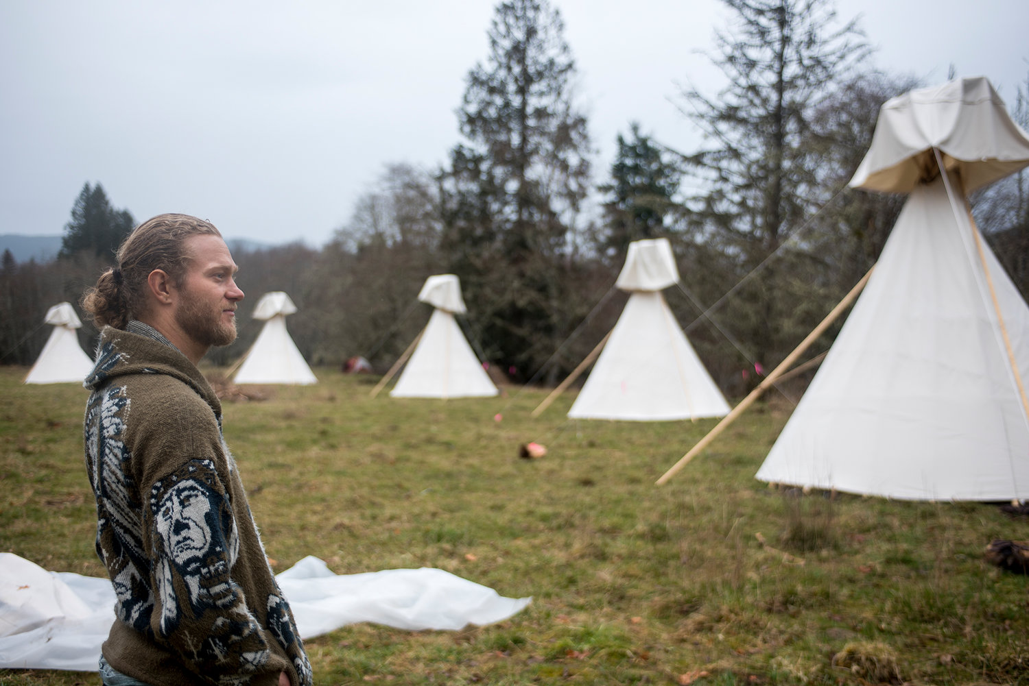 Marc Shackman, shaman and CEO of the Oklevueha Native American Church of Ayahuasca Healings, stands near a group of teepees where church goers stay during the three-day religious ceremonies at the church's property near Elbe on Thursday afternoon.