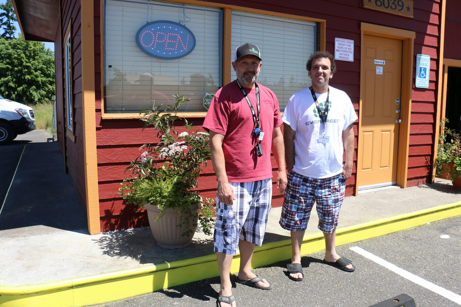 Derek Wilmot and Mike Trobman stand in front of their business Marijuana Mart in Grand Mound on Monday. They are two of the three business partners who opened the store on May 27 as the first recreational marijuana store in the town.