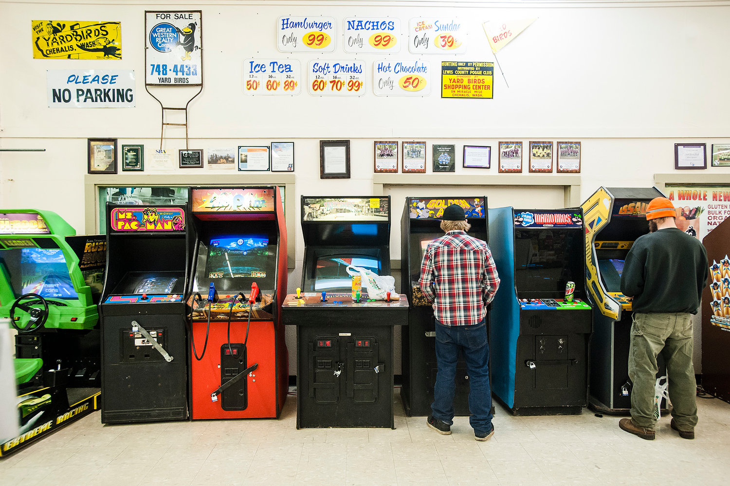 People play arcade games at Yard Birds Mall in Chehalis on Monday, March 3, 2014.