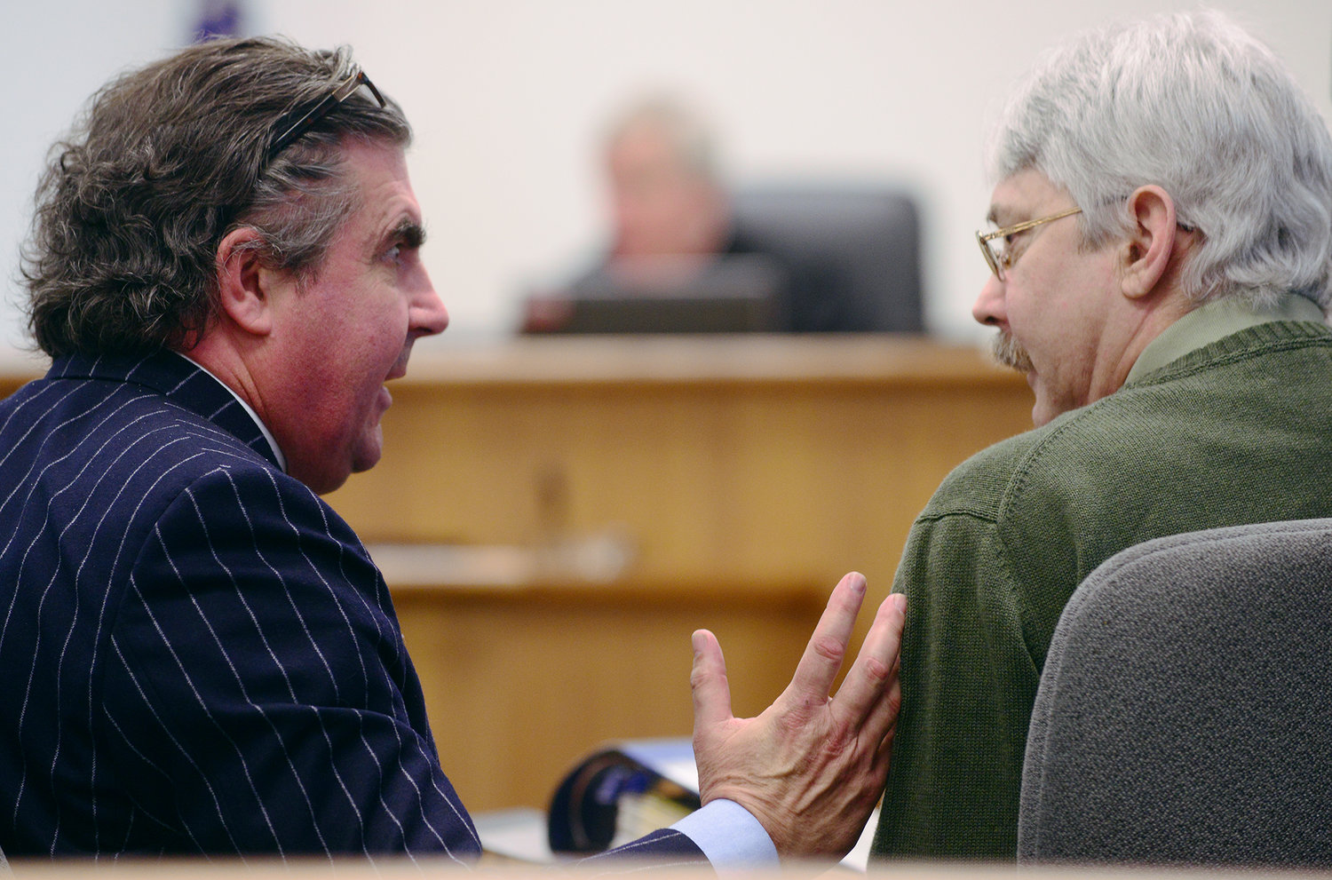 Defense attorney John Crowley, talks to his client, Rick Riffe, right, during a recess in Riffe's double-homicide trial in Lewis County Superior Court on Thursday afternoon at the Lewis County Law and Justice Center in Chehalis.