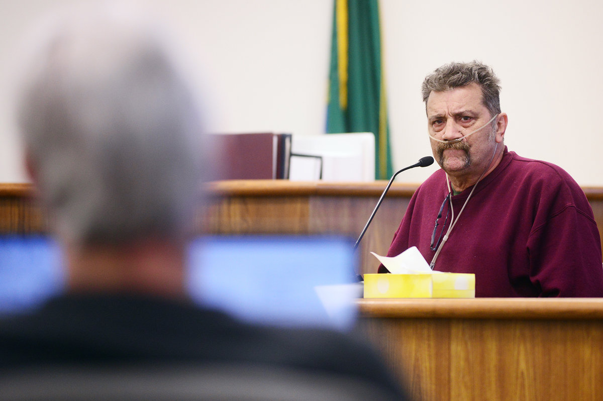 Donald Burgess, right, looks over at Rick Riffe, during his testimony in Riffe's double-homicide trial in Lewis County Superior Court on Wednesday afternoon at the Lewis County Law and Justice Center in Chehalis.