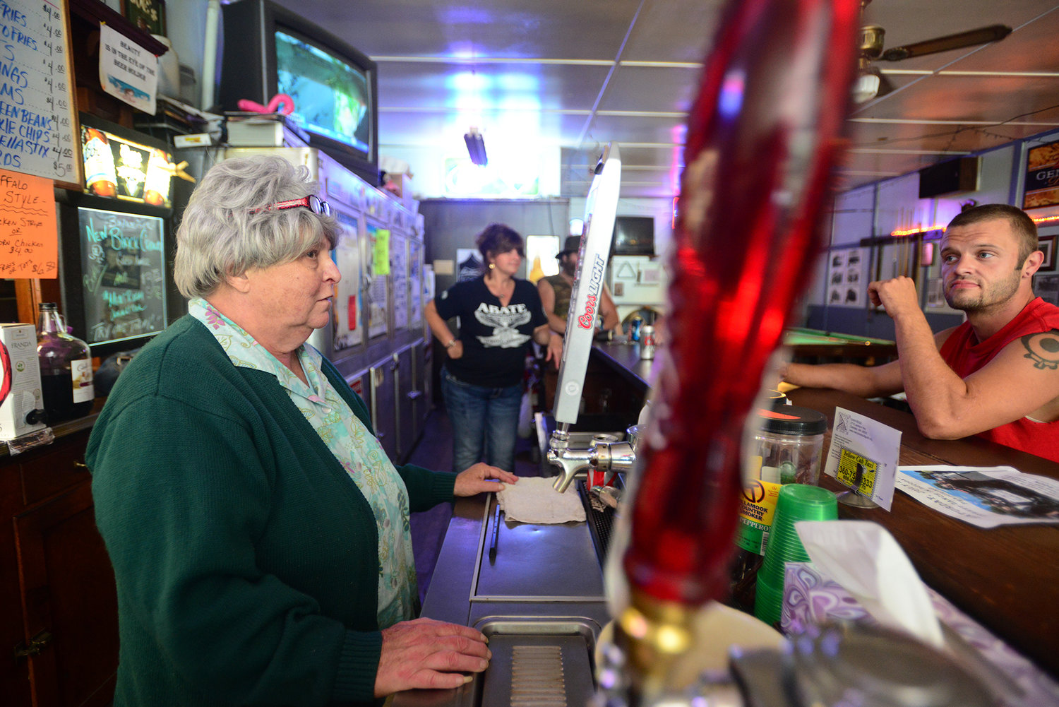 Judy Wall stands behind the bar on Wednesday, July 10, 2013.