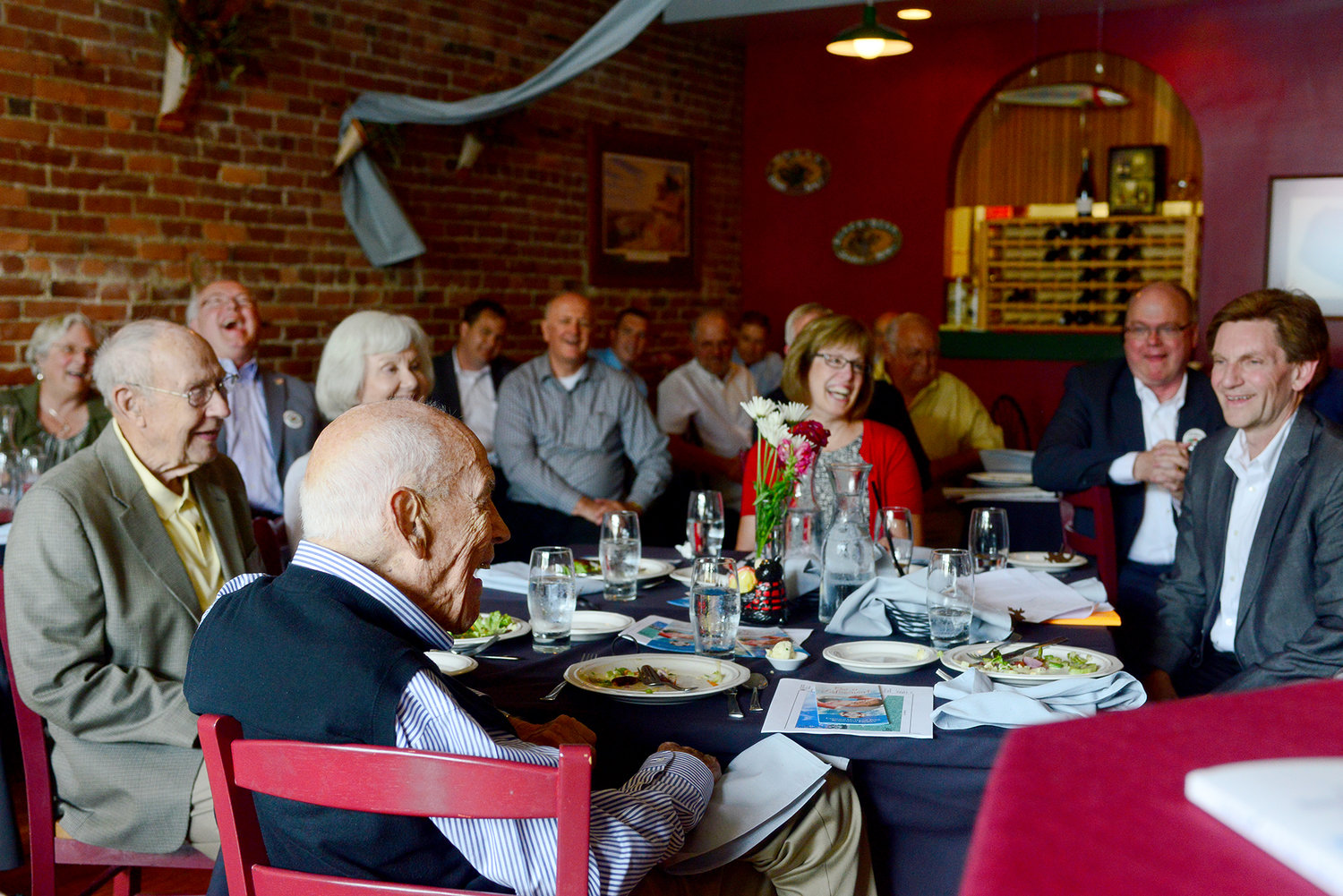 The crowd at a Chehalis Foundation luncheon laughs after hearing a joke from Gail Shaw, center-left, on Friday afternoon at Mackinaw's in Chehalis.