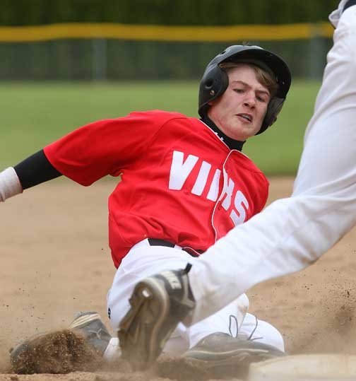 Mossyrock's Kyler Hazen slides safely into third base during the Viking's 11-0 victory against Springdale in Mossyrock Saturday afternoon.